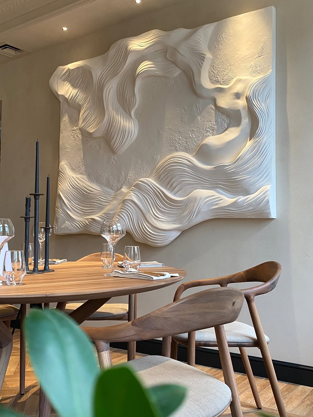 Sculpted plaster relief wall in a restaurant dining room, Jacksonville